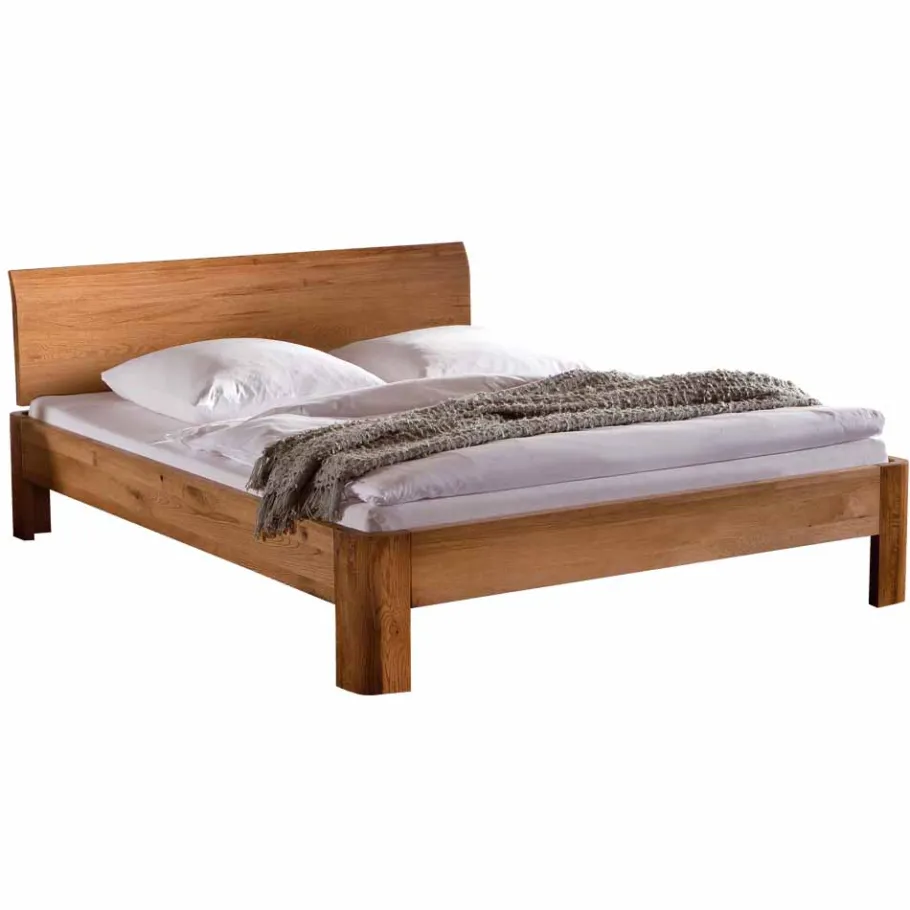 Robustes Eiche Massivholzbett Mora mit gebogenem Kopfteil Betten